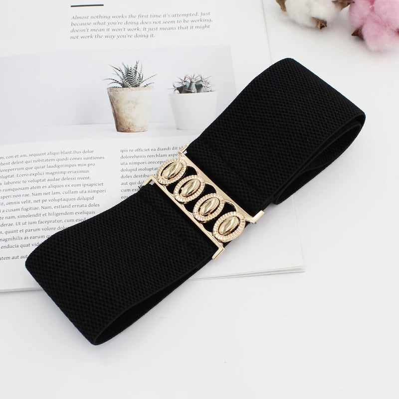 Women’s wide elastic waist belt with metal buckle, corset style cinch belt, black accessory for fashionable outfits.