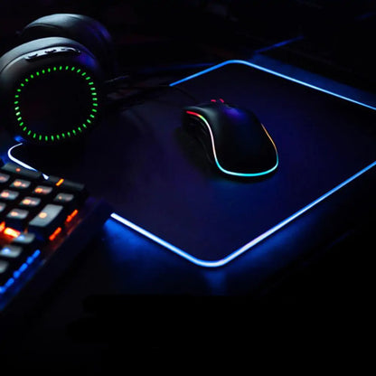 R.E.D. Shopping Symphony RGB luminous mouse pad with colorful LED lighting and smooth surface for gaming and work setups.