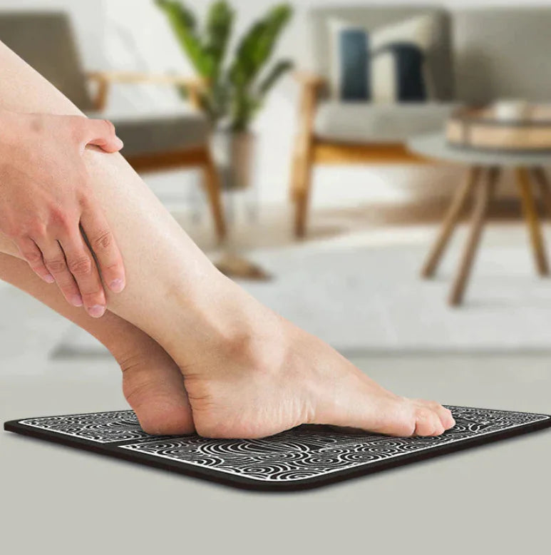 EMS Neuropathy Mat by R.E.D. Shopping for electric muscle stimulation and acupressure therapy, shown on a user's back during use.