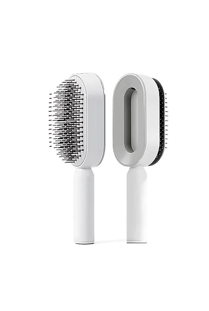 Self-cleaning pet grooming brush by R.E.D. Shopping, showing a close-up of the brush with ergonomic handle and bristles.