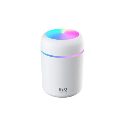 R.E.D. Shopping mini air humidifier in white, compact design for home climate control, emitting a gentle mist.