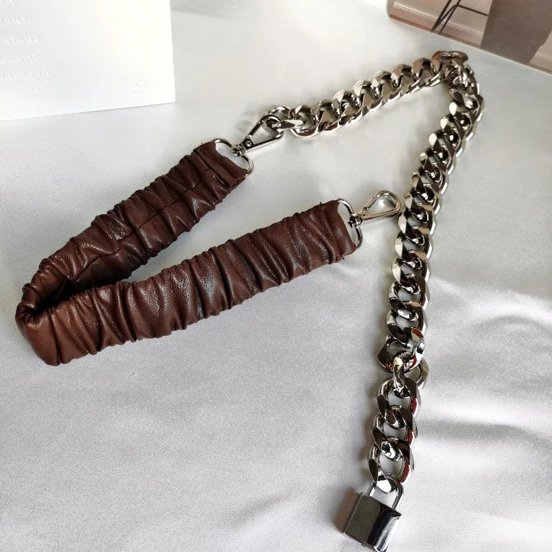 Women’s elastic leather silver chain belt with stretch corset waistband, stylish accessory for fashionable outfits.