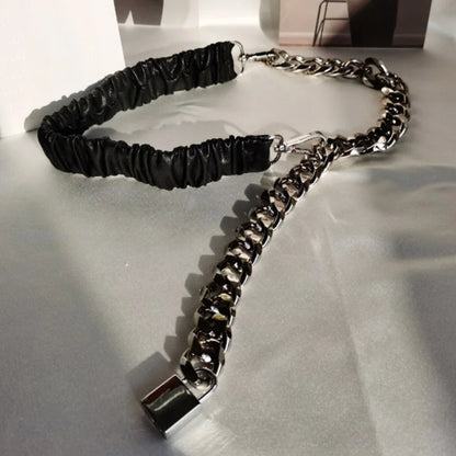 Women’s elastic leather silver chain belt with stretch corset waistband, stylish accessory for fashion and waist accentuation.