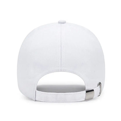 Cotton solid color baseball cap for women with adjustable strap, designed for sun protection and summer wear.