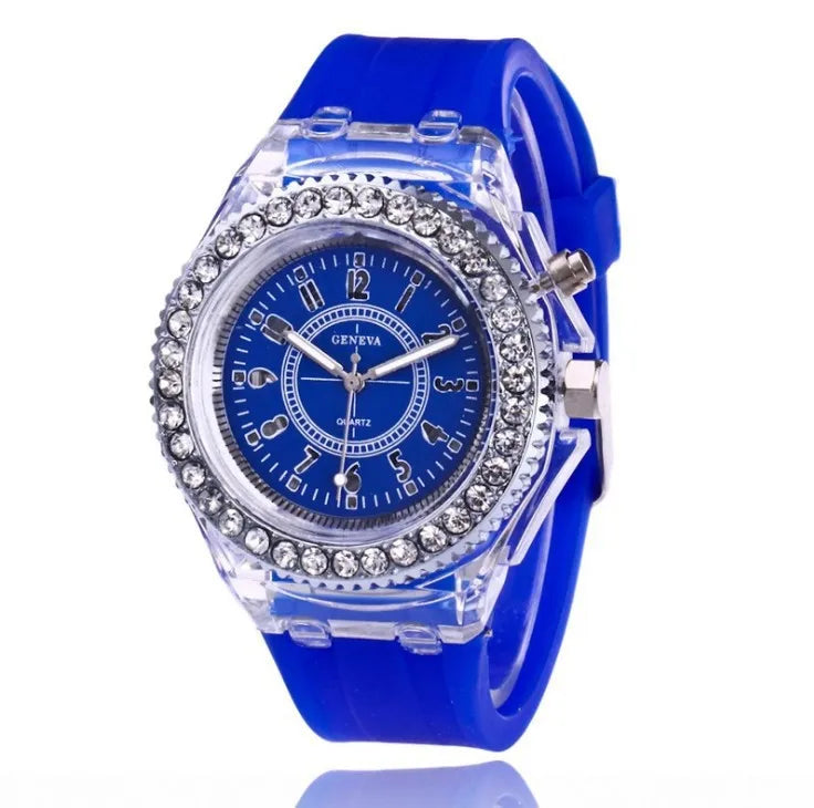 LED Flash Luminous Watch by R.E.D. Shopping featuring a rhinestone-accented silicone strap and a glowing digital display.
