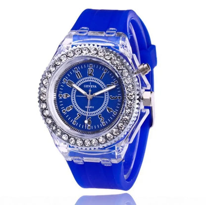 LED Flash Luminous Watch by R.E.D. Shopping featuring a rhinestone-accented silicone strap and a glowing digital display.