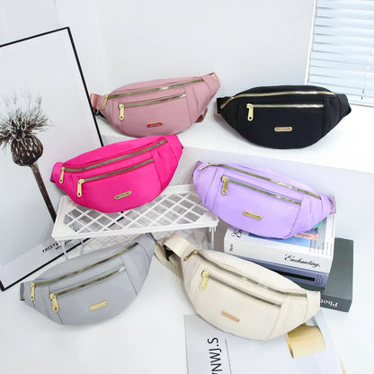 Women's R.E.D. Sports Waist Bag with multiple compartments, worn as a fanny pack or crossbody for outdoor activities.