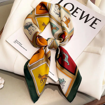 Women's square silk scarf by R.E.D. Shopping, styled as a hairband and neck shawl with vibrant patterns and smooth silk fabric.