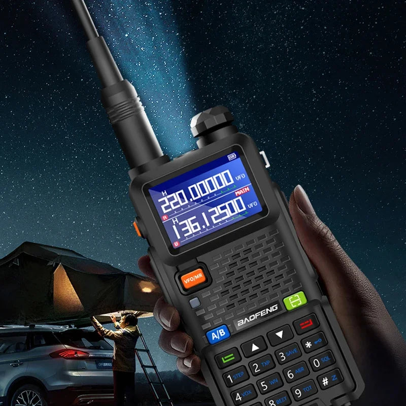 Baofeng UV-5RM walkie talkie with four-band radio, 999 channels, and 3800mAh battery, shown in a close-up view.