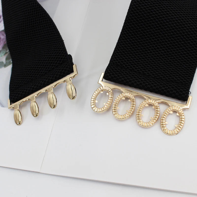 Women’s wide elastic waist belt with metal buckle and corset design, perfect for cinching dresses or high-waisted outfits.