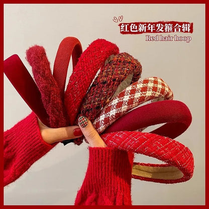 Red Christmas fashion headband with vintage wool style, festive cloth hair accessory for holiday styling.