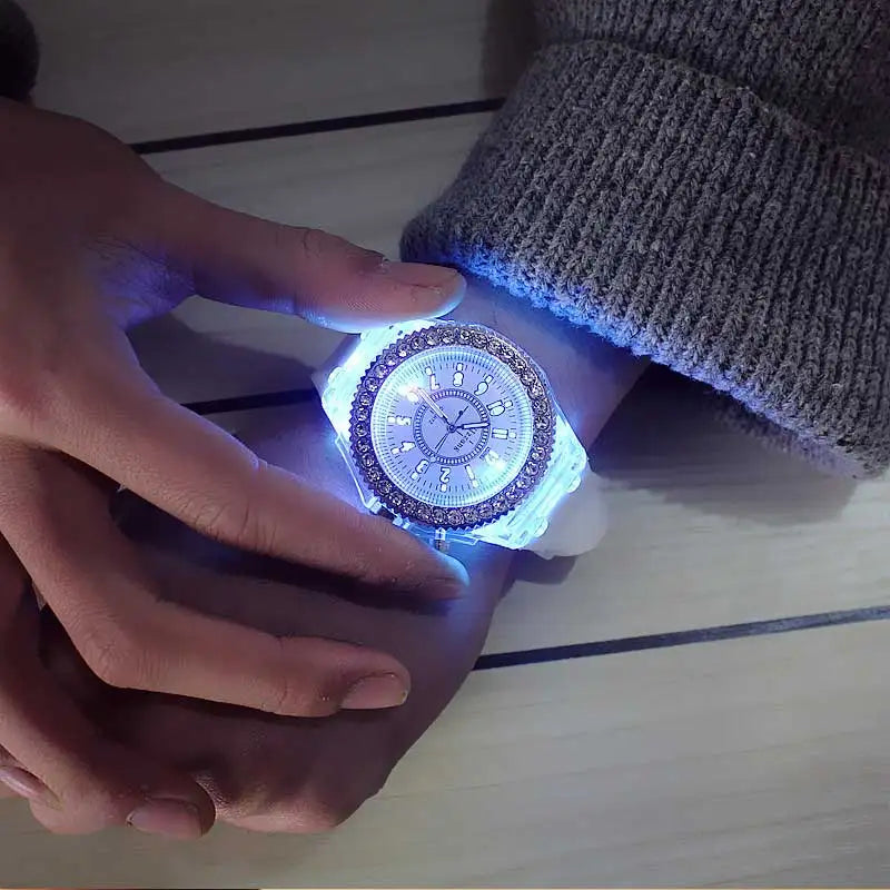 LED Flash Luminous Watch by R.E.D. Shopping with rhinestone accents and silicone strap, suitable for kids and adults.