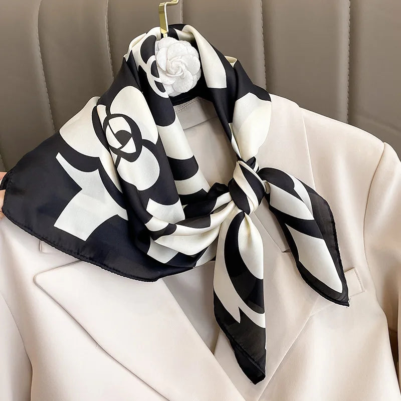 Elegant square silk scarf from R.E.D. Shopping, versatile hairband and neck shawl in vibrant silk fabric with intricate pattern.