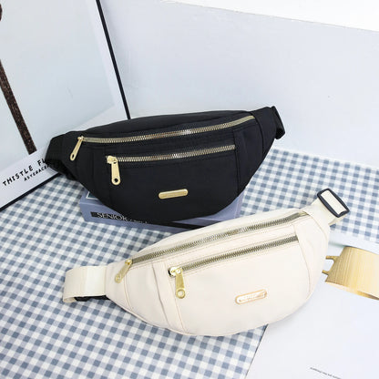 Women's R.E.D. Sports Waist Bag with multiple compartments, designed as a versatile fanny pack and crossbody for outdoor activities.