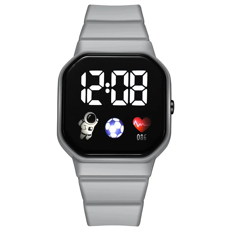 Kids LED digital sports watch with football design and silicone strap, suitable for boys and girls.