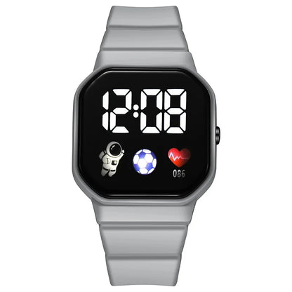 Kids LED digital sports watch with football design and silicone strap, suitable for boys and girls.