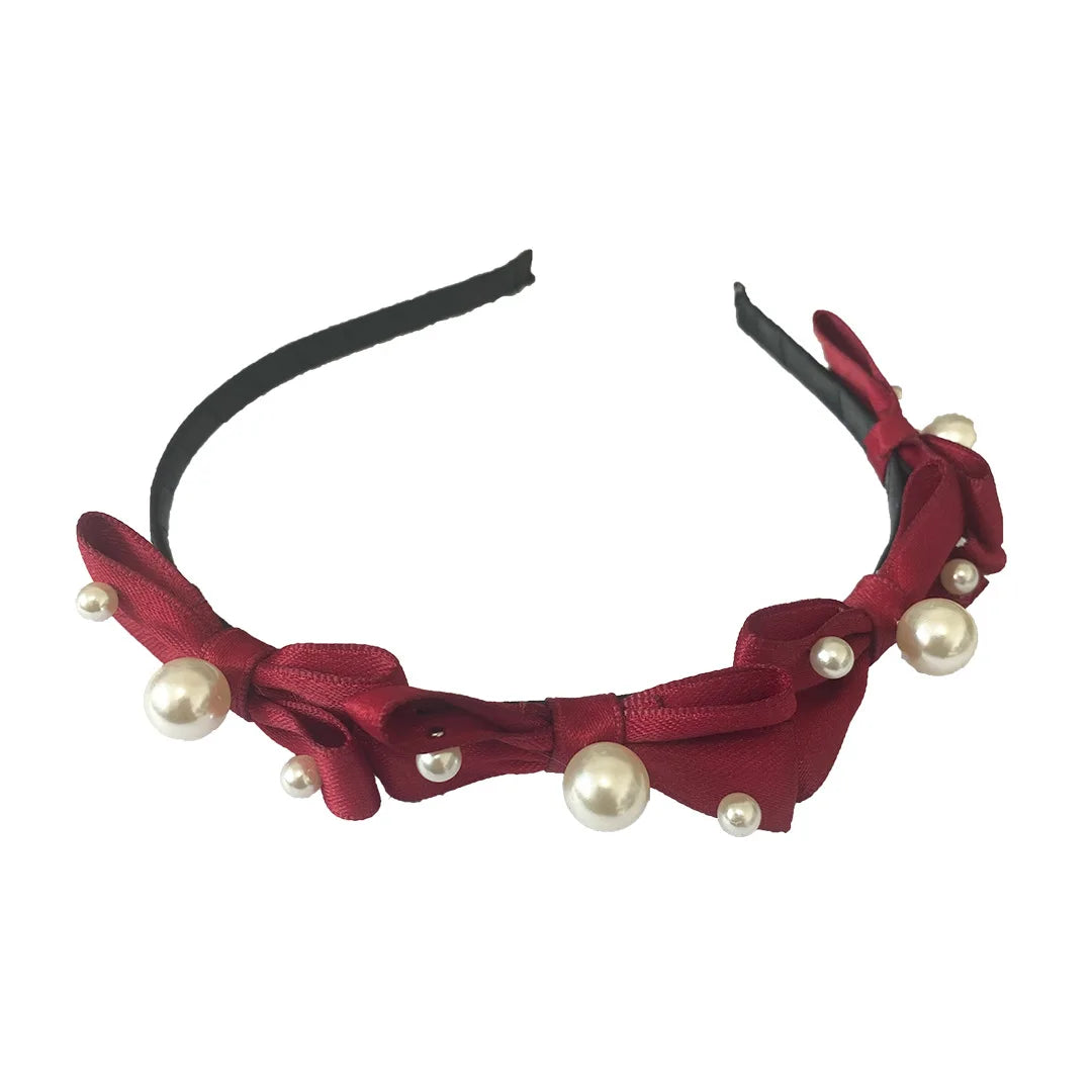 Red Christmas fashion headband with vintage wool style, festive cloth hair accessory for holiday celebrations