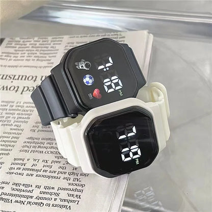Kids LED digital sports watch with football design, silicone strap, suitable for boys and girls, by R.E.D. Shopping.