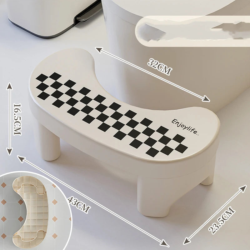 Plastic toilet footstool with non-slip pads, thickened design, suitable for children, bathroom accessory for improved squatting posture.