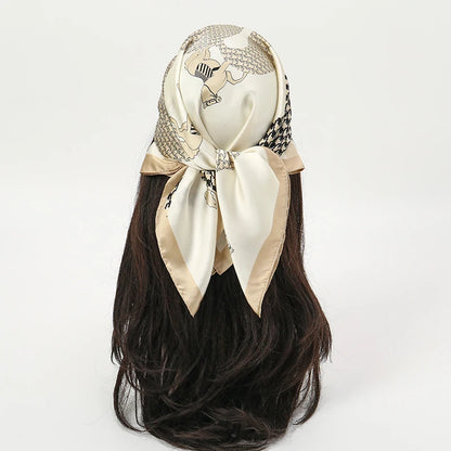 Elegant square silk scarf by R.E.D. Shopping, versatile as a hairband or neck shawl, featuring a stylish pattern and smooth fabric.