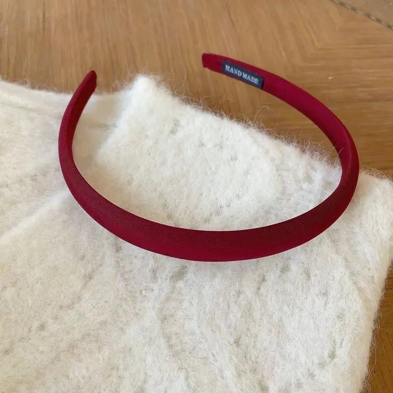 Red Christmas fashion headband with vintage wool style for festive hair accessories, designed by R.E.D. Shopping.