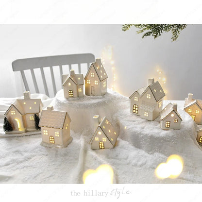 Christmas luminous snow house ceramic ornament with LED lighting, tabletop holiday decor by R.E.D. Shopping.
