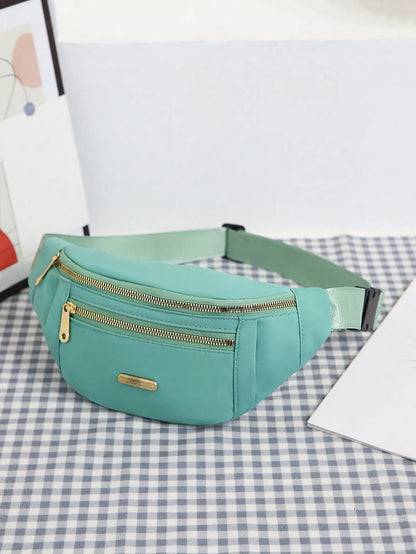 Women's R.E.D. Shopping sports waist bag with multiple compartments, designed for outdoor activities, worn as a fanny pack or crossbody.
