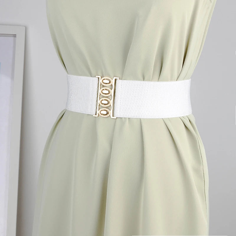 Women’s wide elastic waist belt with metal buckle from R.E.D. Shopping, featuring a corset-style design for stylish cinching.