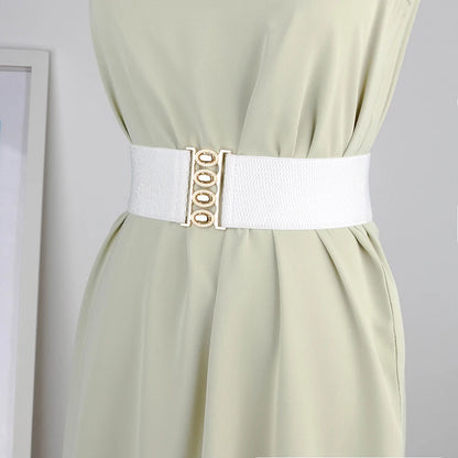 Women’s wide elastic waist belt with metal buckle from R.E.D. Shopping, featuring a corset-style design for stylish cinching.