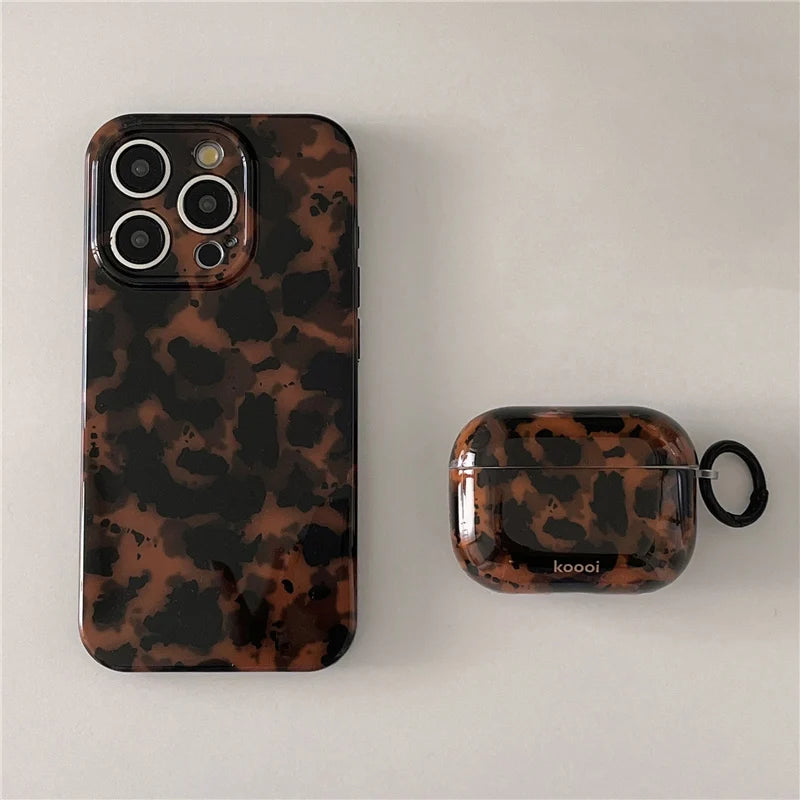 Retro amber leopard silicone iPhone case with animal print, protective cover for mobile phones, featuring bold design and flexible material.