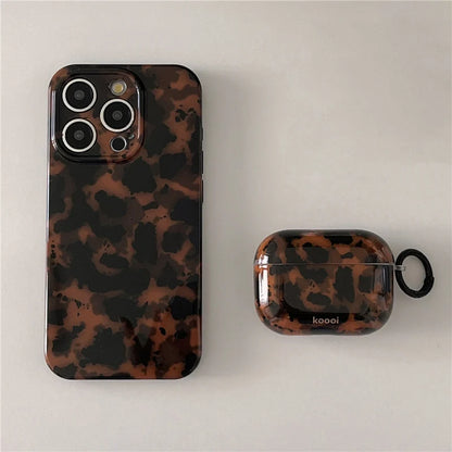 Retro amber leopard silicone iPhone case with animal print, protective cover for mobile phones, featuring bold design and flexible material.