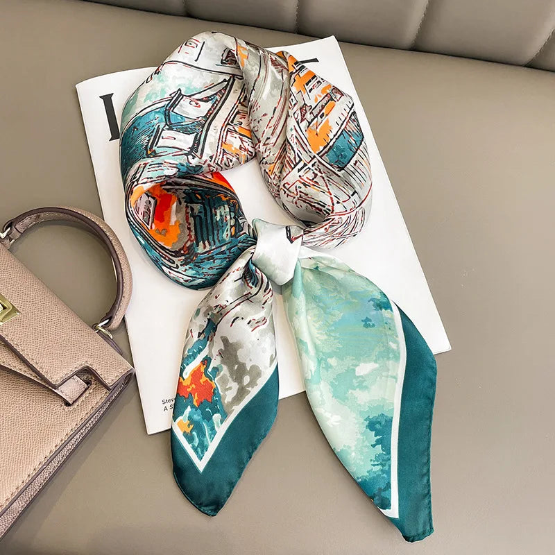 Elegant R.E.D. Shopping square silk scarf, versatile as a hairband or neck shawl, with a stylish pattern and smooth fabric.