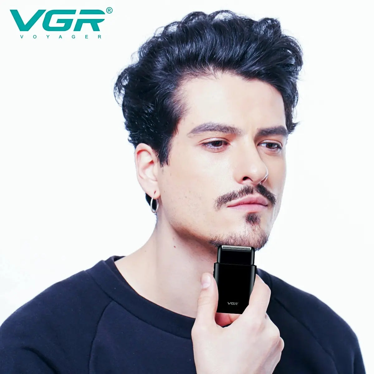 R.E.D. VGR portable electric shaver with compact design, USB charging, for men's beard trimming and grooming.