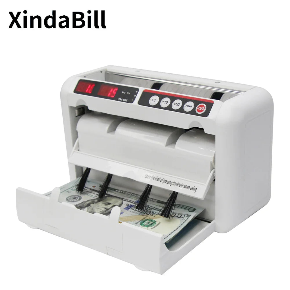 Portable R.E.D. Shopping K-1000 UVMG money counter with multi-currency bill detection and built-in battery for retail use.