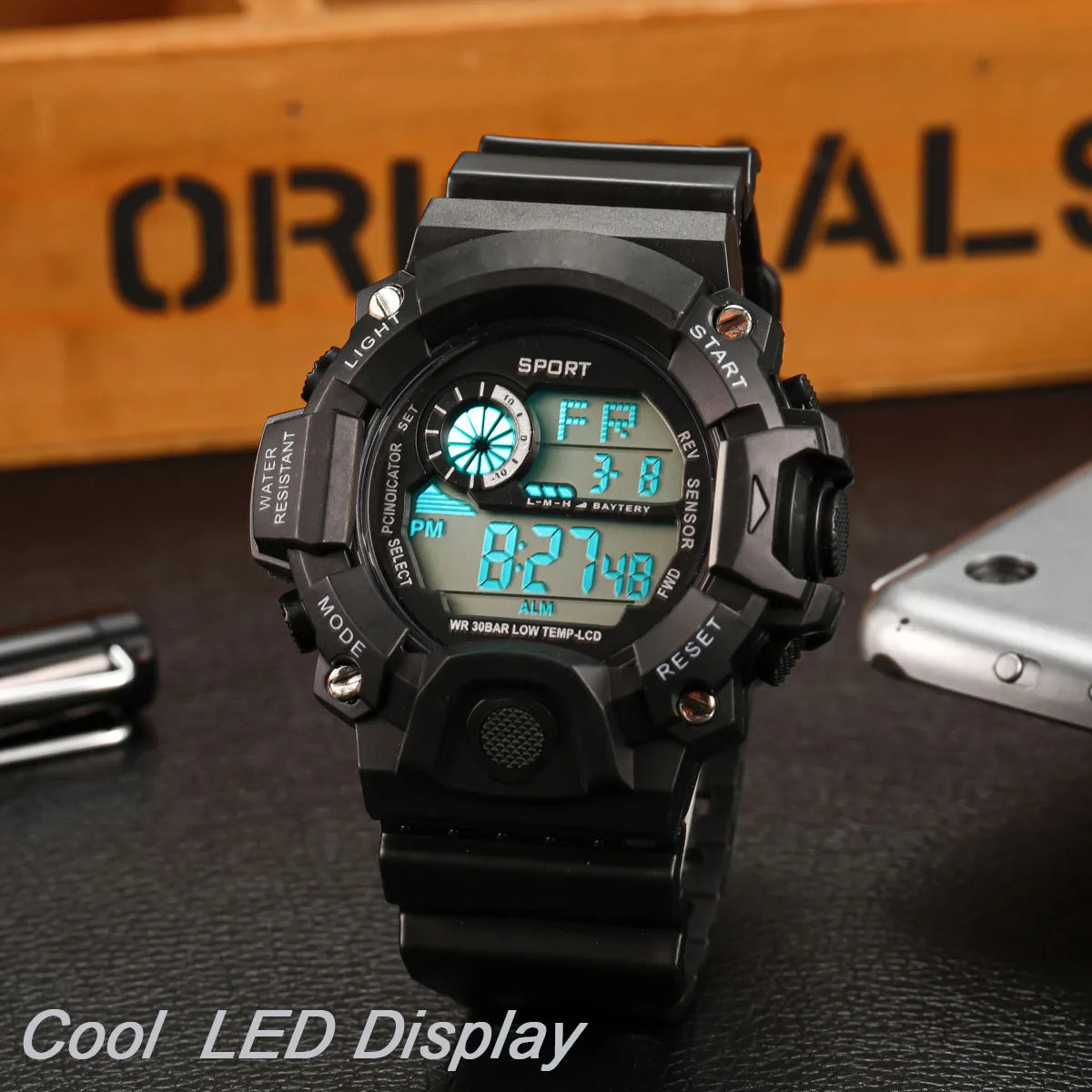Men's R.E.D. Sports electronic wristwatch with large dial, waterproof design, luminous display, and alarm feature.