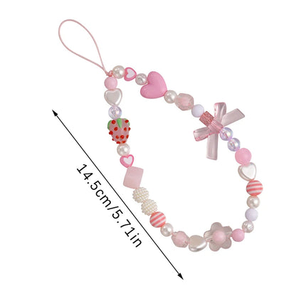 Sweet strawberry flower bead phone strap charm with a keychain pendant, designed for women and girls as a stylish bag accessory.