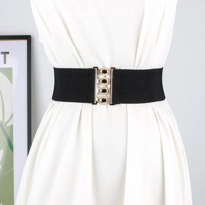 Women's wide elastic waist belt with metal buckle, corset style cinch belt from R.E.D. Shopping, stylish clothing accessory.
