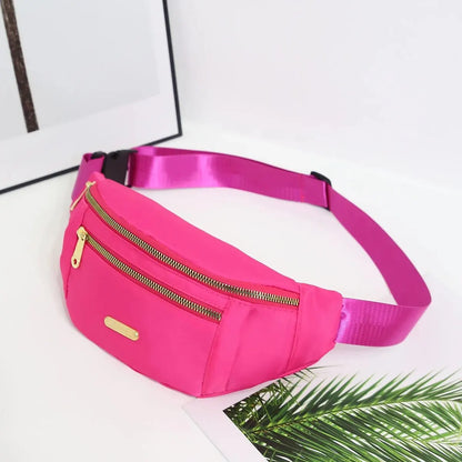 Women's R.E.D. Sports Waist Bag with multiple compartments, designed as a versatile fanny pack and crossbody for outdoor activities.
