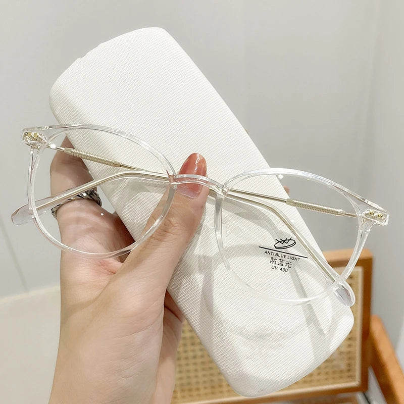Y2K transparent round computer glasses with anti-blue light lenses, stylish eyewear by R.E.D. Shopping for digital screen protection.