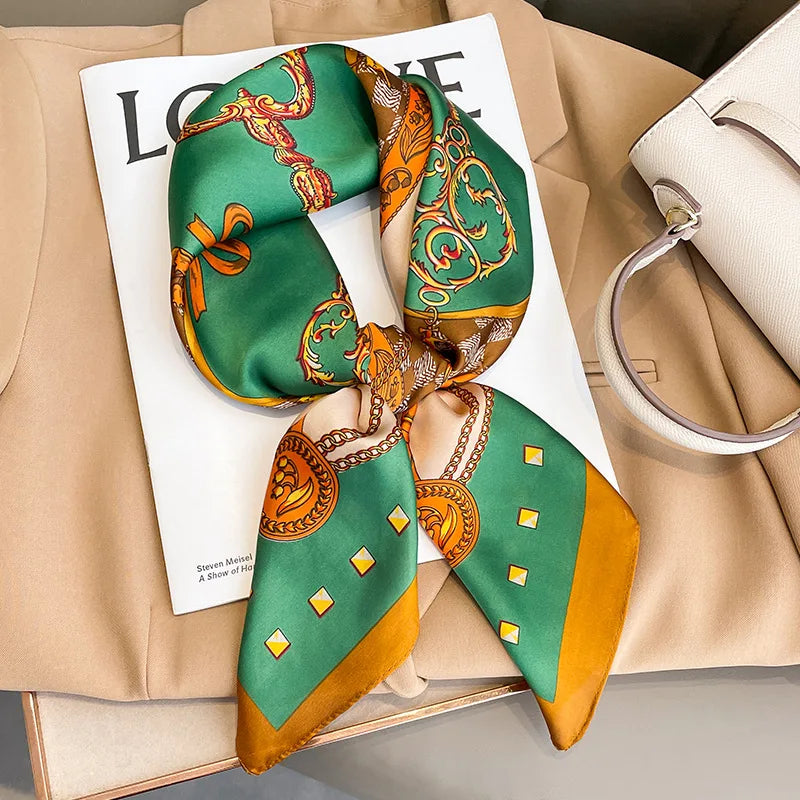 Elegant square silk scarf by R.E.D. Shopping, styled as a women's hairband and neck shawl, showcasing vibrant patterns and smooth fabric.