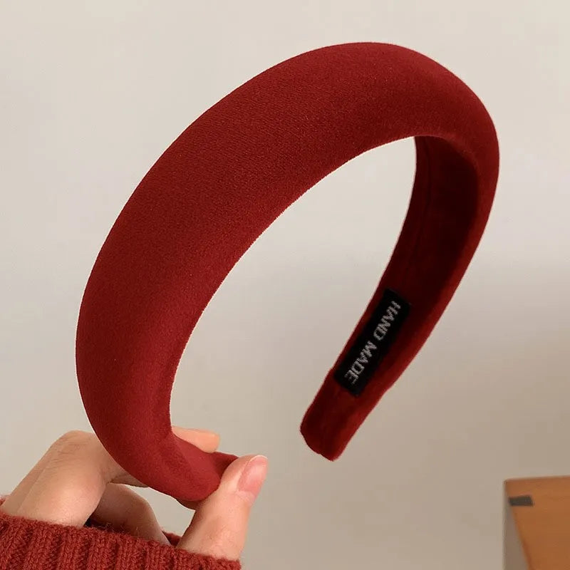 Red Christmas fashion headband with vintage wool style, stylish cloth hair accessory ideal for festive holiday looks.