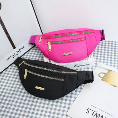 Women's R.E.D. Sports Waist Bag with multiple compartments, designed as a fanny pack and crossbody for outdoor activities.