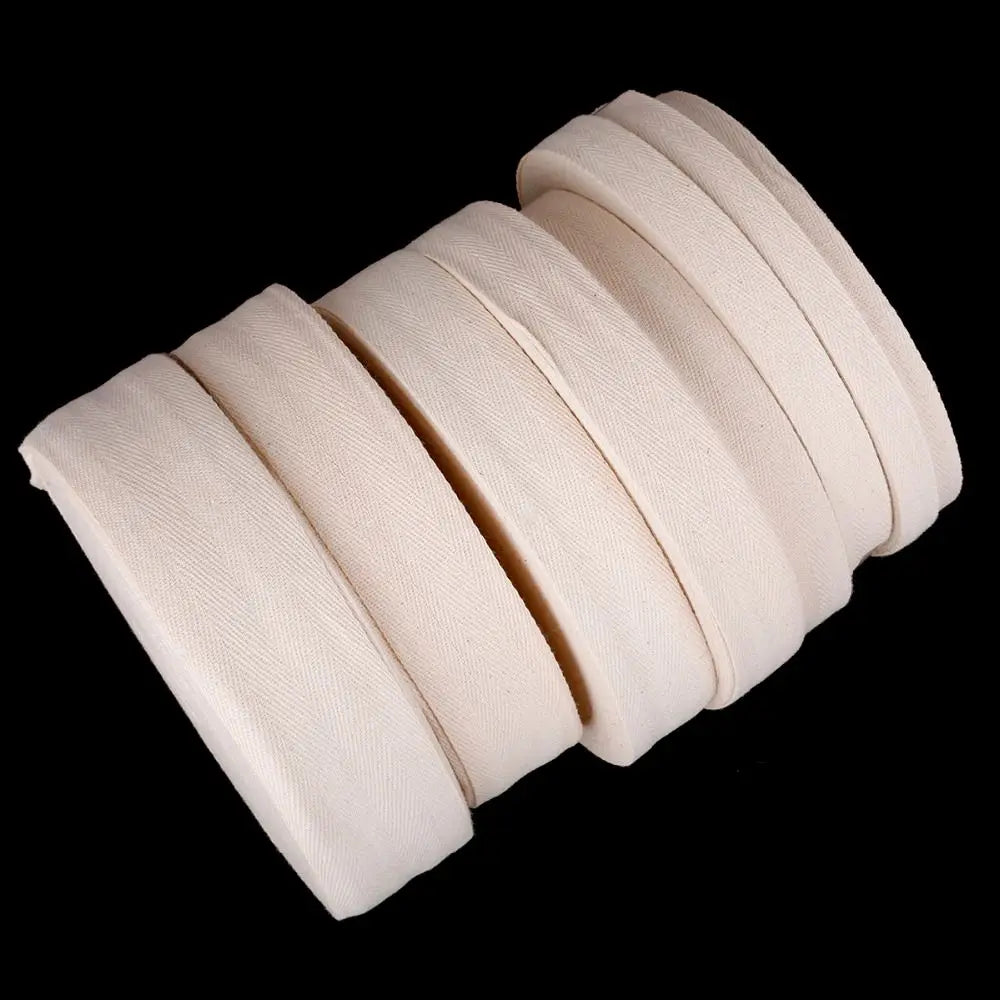 50m cotton bias binding tape roll in herringbone design, 1-5cm wide, perfect for sewing and arts and crafts projects.