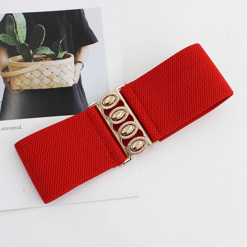 Women’s wide elastic waist belt with metal buckle, corset style cinch belt, stylish clothing accessory for fashion outfits.