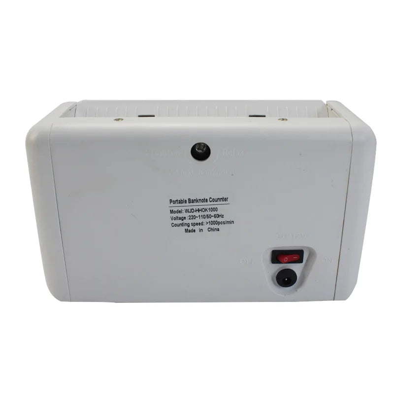 Portable R.E.D. Shopping K-1000 UVMG money counter with multi-currency detection, bill counter, cash note detector, and built-in battery.