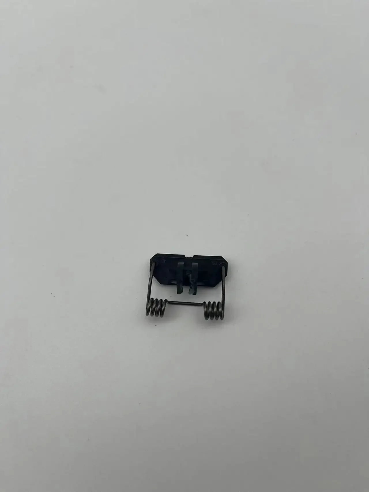 Kemei KM-2296 professional hair clipper replacement plastic spring part for hair cutting tools.