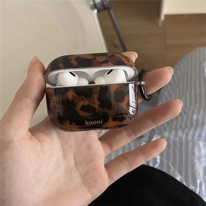 Retro amber leopard silicone iPhone case with animal print design, offering stylish protection for mobile phones.