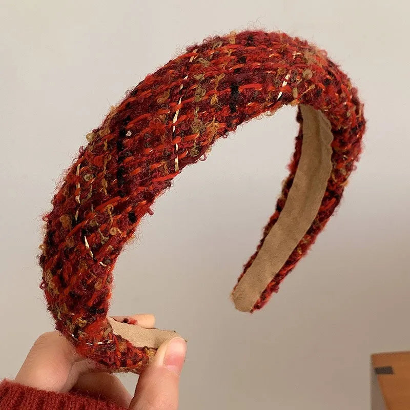 Red Christmas fashion headband with vintage wool style, festive cloth hair accessory for holiday styling.