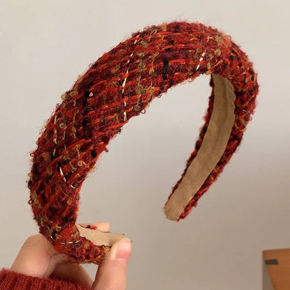Red Christmas fashion headband with vintage wool style, festive cloth hair accessory for holiday styling.