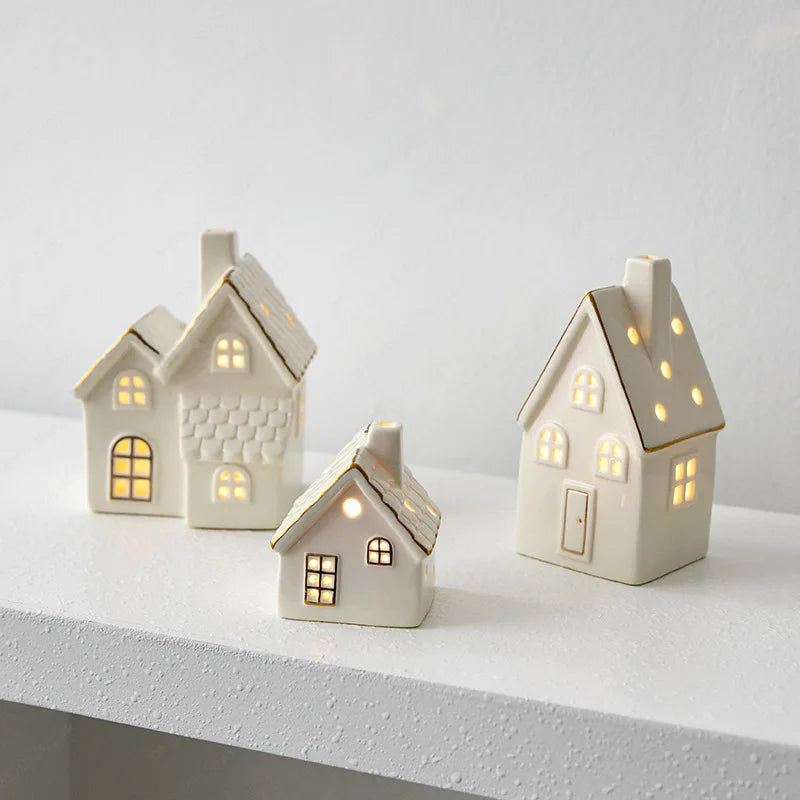 Christmas luminous snow house ceramic ornament from R.E.D. Shopping, illuminated LED tabletop holiday home decor with snow-themed design.